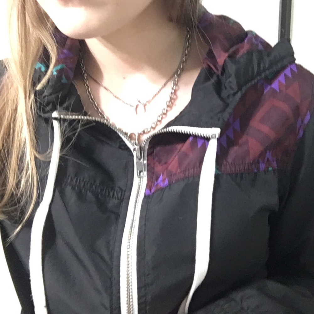 black windbreaker
